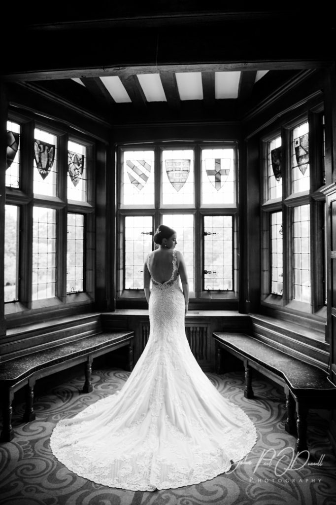 bride in the window at Fanhams Hall
