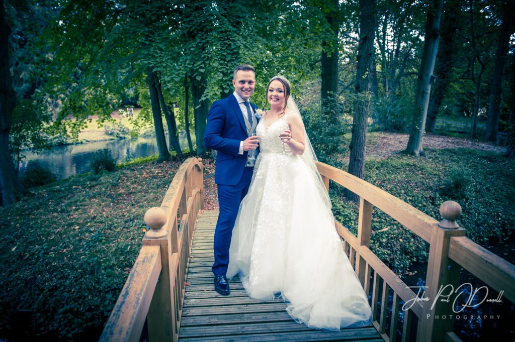 Bride and Groom on the bridge at Mulberry House